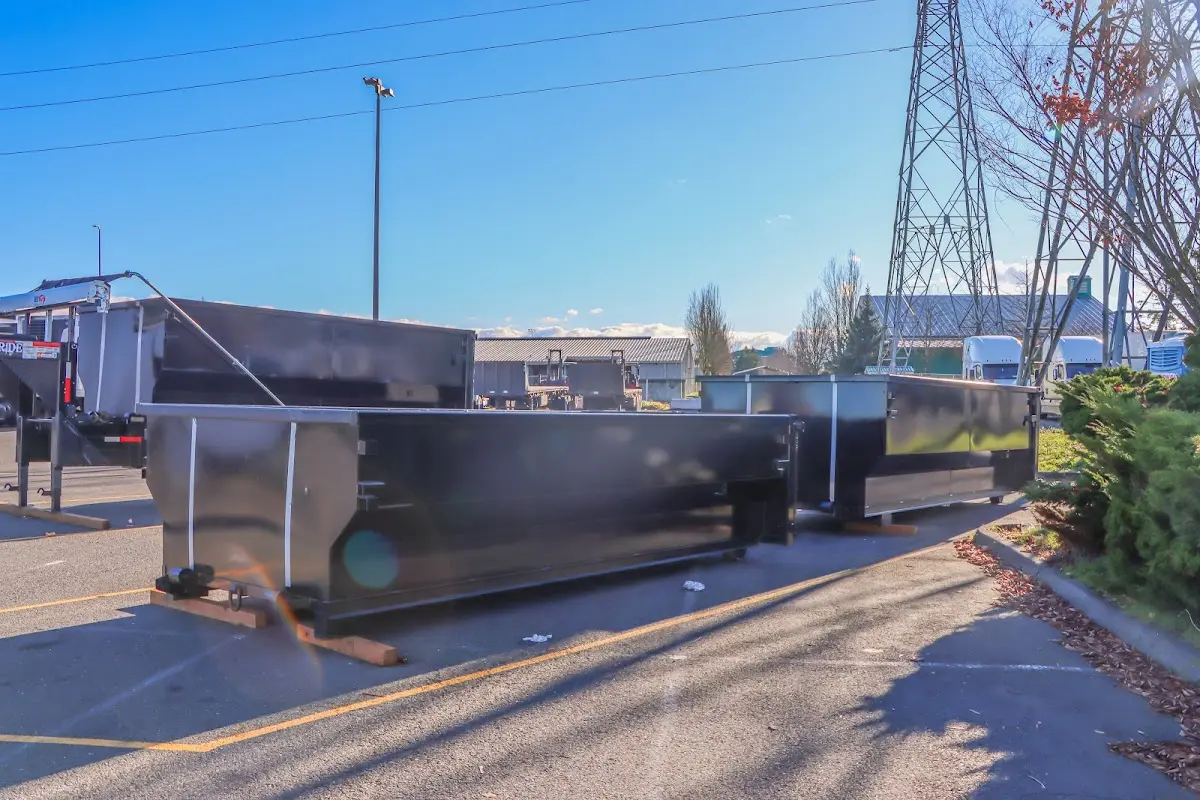Roll-off dumpster ready for waste disposal at job site for Yard Waste Dumpster Rental in Timberlane